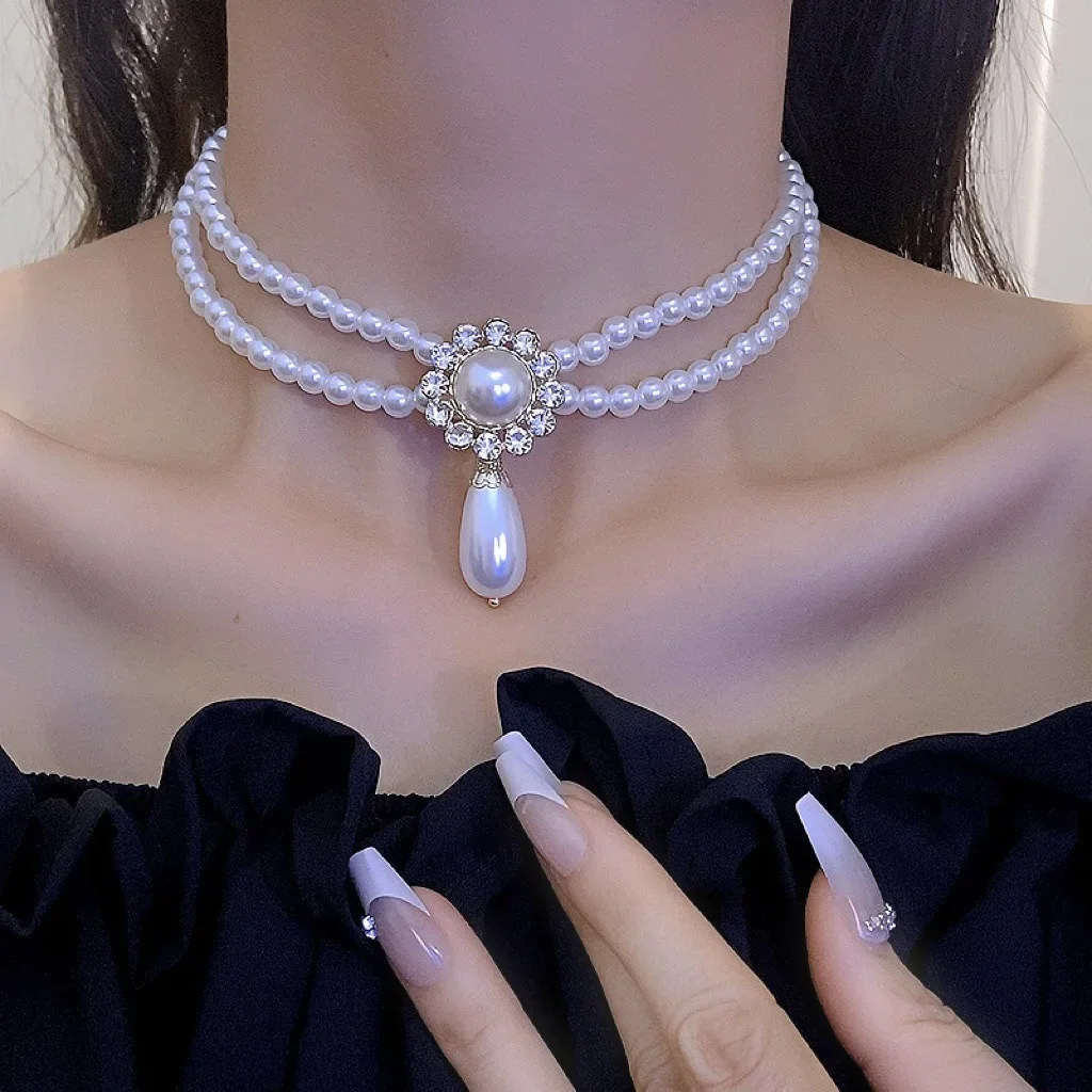 Diamond-encrusted water drop pearl double-layer necklace fashion temperament light luxury collarbone chain personality niche new item jewelry wholesale women
Diamond-encrusted water drop pearl double-layer necklace fashion temperament light luxury collarbone chain personality niche new item jewelry wholesale women