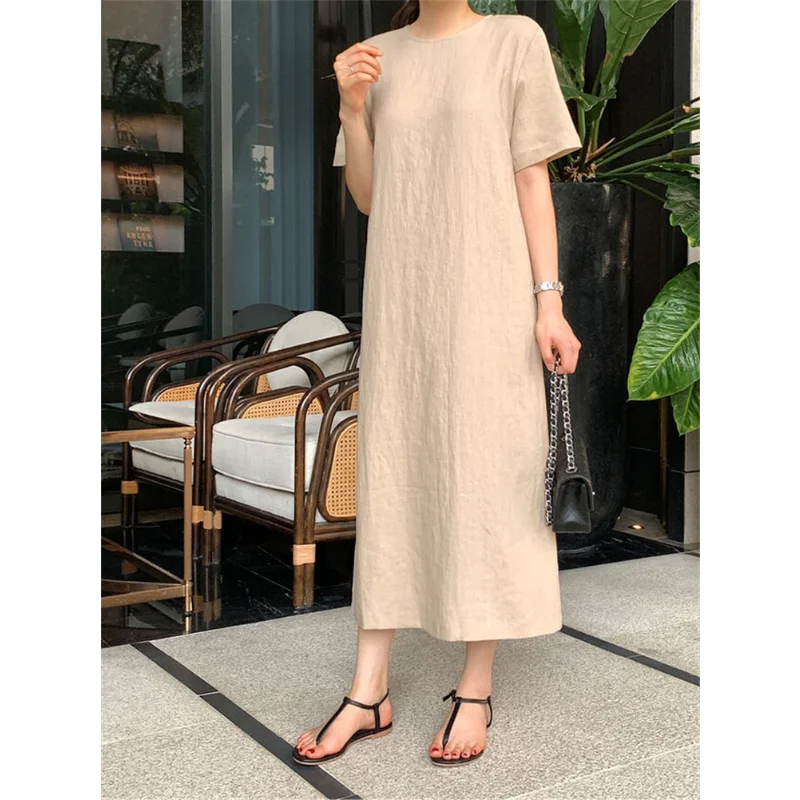 Round Neck Simple Versatile Black Short-sleeved Long Dress Women Split Back Loose French Office Lady Elegant Dress Summer
Round Neck Simple Versatile Black Short-sleeved Long Dress Women Split Back Loose French Office Lady Elegant Dress Summer