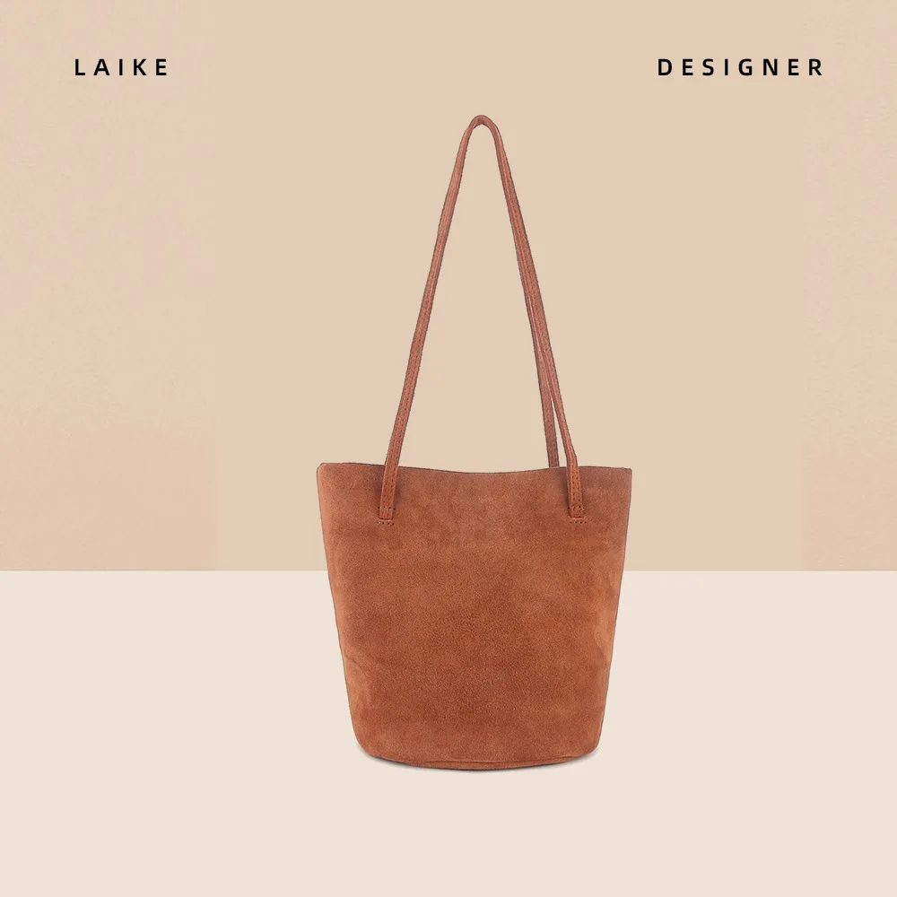 Autumn and winter new leather matte bucket bag women's high-end sense niche versatile tote shoulder armpit messenger bag
Autumn and winter new leather matte bucket bag women's high-end sense niche versatile tote shoulder armpit messenger bag