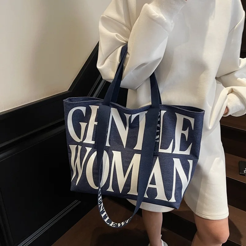 2025 Trendy Gentle Woman Canvas Shoulder Bag with Dual Straps Spacious Letter Design Fashionable Everyday Tote for Women
2025 Trendy Gentle Woman Canvas Shoulder Bag with Dual Straps Spacious Letter Design Fashionable Everyday Tote for Women