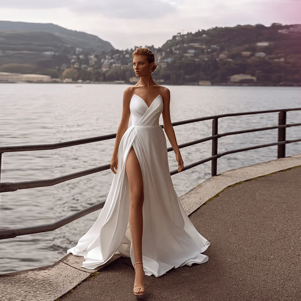 Customized Elegant Strapless Satin Corset Pleated Wedding Dress Backless Side High Split Bridal Gown Trian
Customized Elegant Strapless Satin Corset Pleated Wedding Dress Backless Side High Split Bridal Gown Trian