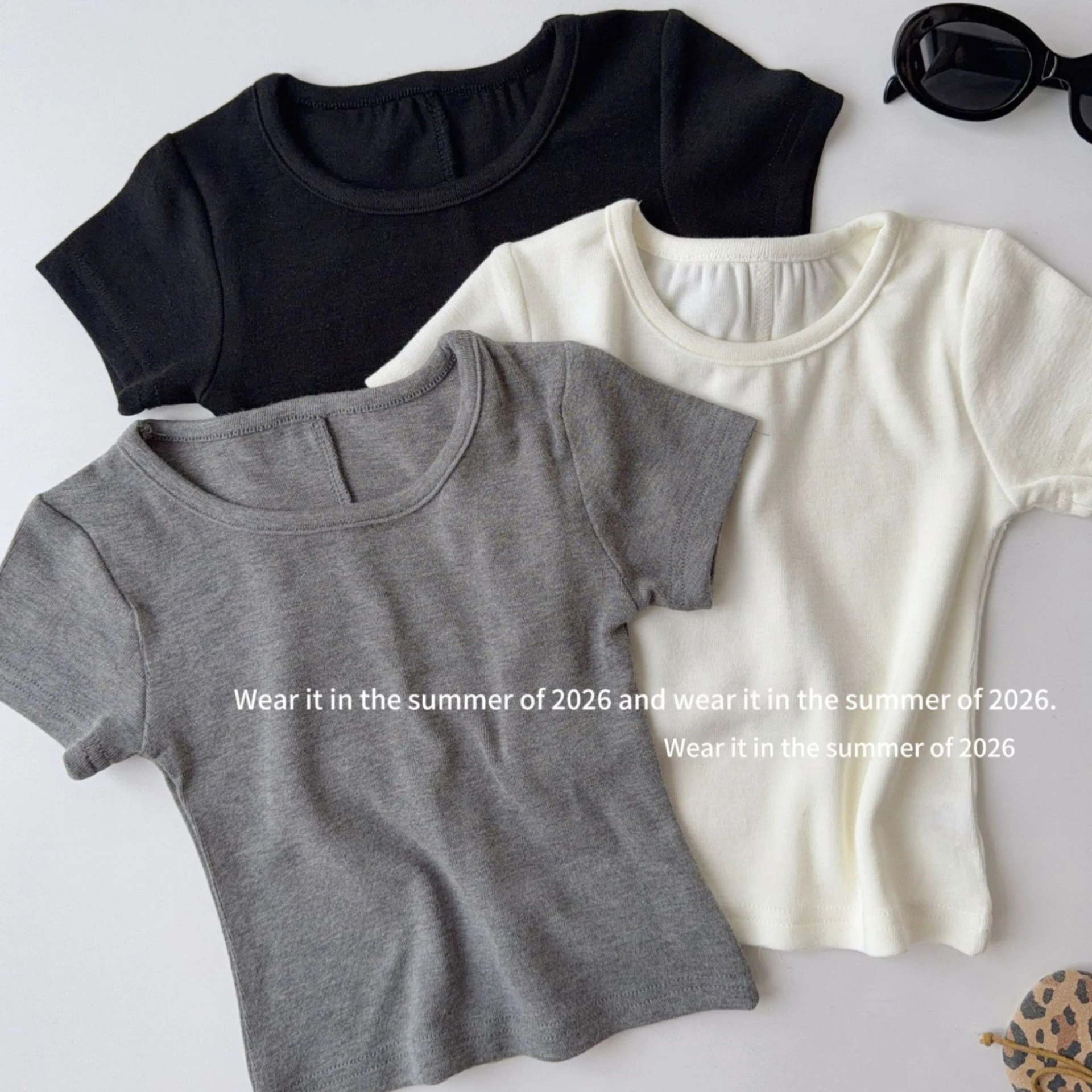 Girls T-shirt 2026 Spring and Summer New Childrens Clothes Korean Girl Baby Solid Color Simple Baby Cotton Short-sleeved T-shirt
Girls T-shirt 2026 Spring and Summer New Childrens Clothes Korean Girl Baby Solid Color Simple Baby Cotton Short-sleeved T-shirt