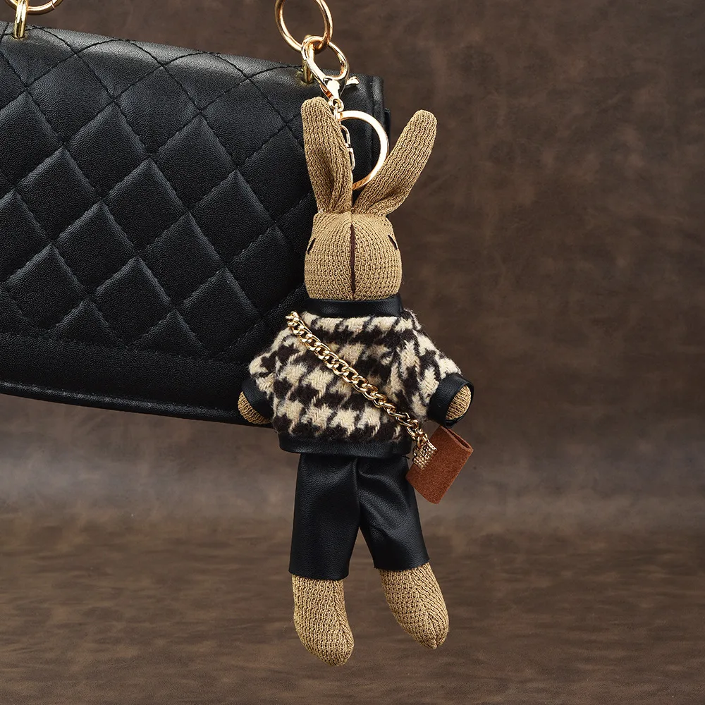 Fashion Thousand Bird Lattice Rabbit Fluffy Doll Keychain Cartoon Wear Sweater Leather Pant Carrying Crossbody Bag Bunny Keyring
Fashion Thousand Bird Lattice Rabbit Fluffy Doll Keychain Cartoon Wear Sweater Leather Pant Carrying Crossbody Bag Bunny Keyring