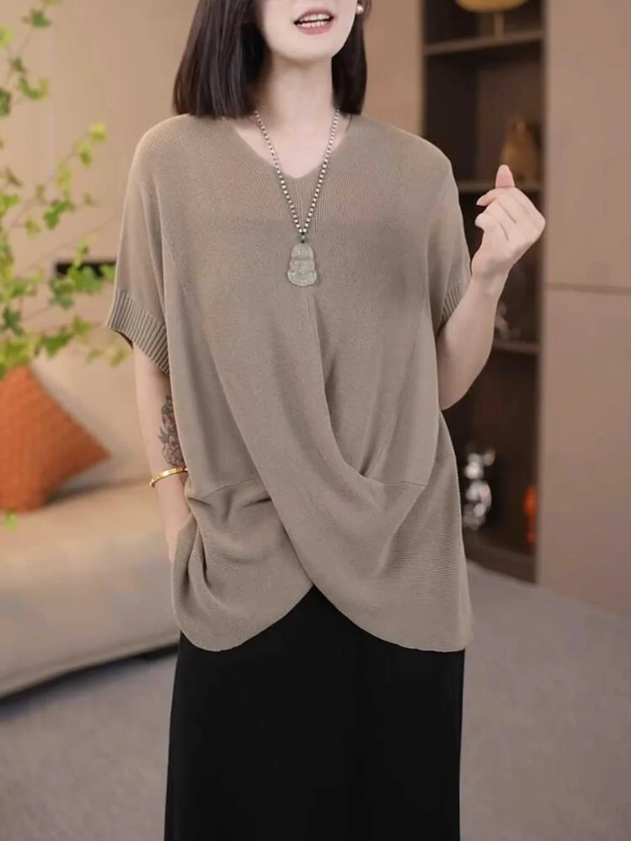 Irregular women's mid-to-long top, summer thin version large size, fashionable slimming, short-sleeved knitted sweater pullover
Irregular women's mid-to-long top, summer thin version large size, fashionable slimming, short-sleeved knitted sweater pullover