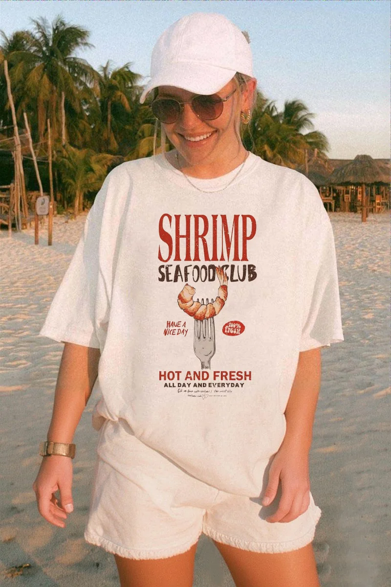 Женская дорожная модная стильная футболка с круглым вырезом и забавным принтом, милая повседневная женская белая летняя футболка с клубным узором из морепродуктов
Женская дорожная модная стильная футболка с круглым вырезом и забавным принтом, милая повседневная женская белая летняя футболка с клубным узором из морепродуктов