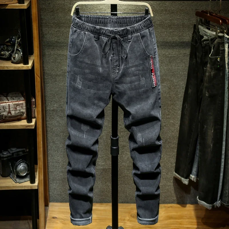 Designer Plus Size 9XL 10XL Jeans for Men Elastic Waist Loose Comfortable Casual Harem Pants Black Blue Denim Trousers
Designer Plus Size 9XL 10XL Jeans for Men Elastic Waist Loose Comfortable Casual Harem Pants Black Blue Denim Trousers
