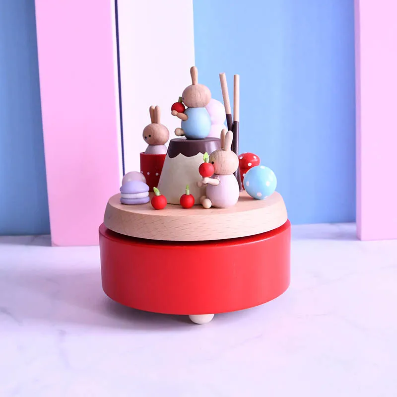 Red Christmas gift rotatable wooden music box handmade clockwork music box clockwork cartoon dessert party ornaments
Red Christmas gift rotatable wooden music box handmade clockwork music box clockwork cartoon dessert party ornaments
