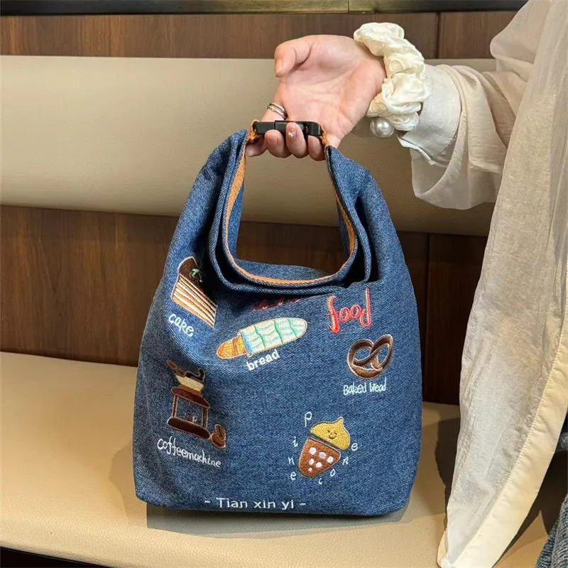Portable Large-capacity High-value Denim Commuter Handbag Student Embroidered Insulation Storage Bag
Portable Large-capacity High-value Denim Commuter Handbag Student Embroidered Insulation Storage Bag