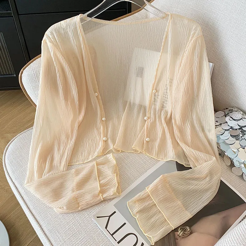 Women Clothing Long Sleeve Knitted Sweater Women Cardigans Fashion V-Neck Sunscreen White Knit Sweater Cardigan Women Tops Q3542
Women Clothing Long Sleeve Knitted Sweater Women Cardigans Fashion V-Neck Sunscreen White Knit Sweater Cardigan Women Tops Q3542