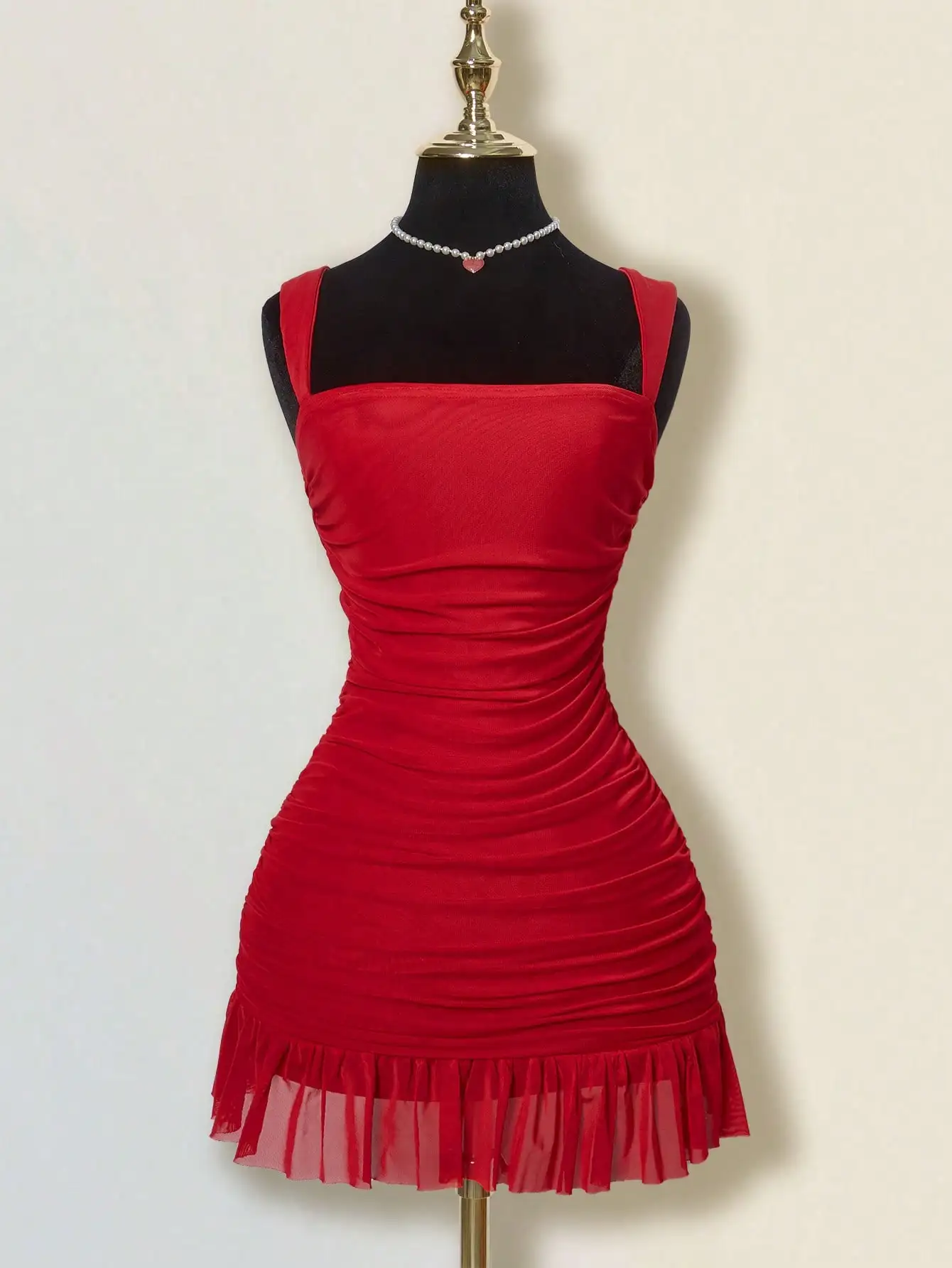 Women's Red Solid Mesh Ruched Bodycon Mini Dress with Ruffle Hem
Women's Red Solid Mesh Ruched Bodycon Mini Dress with Ruffle Hem