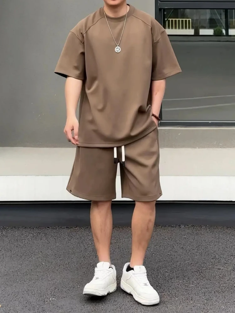 2026 Summer New Solid Color Casual Sports Sets Loose Fit Couple Tracksuits Streetwear Short Sleeve Shorts 2 Piece Outfits
2026 Summer New Solid Color Casual Sports Sets Loose Fit Couple Tracksuits Streetwear Short Sleeve Shorts 2 Piece Outfits