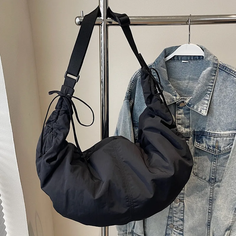 Nylon Drawstring Crossbody Bag Large Capacity Daily Dumpling Handbag Shoulder Bags for Women Large Capacity Pleated Crescent Bag
Nylon Drawstring Crossbody Bag Large Capacity Daily Dumpling Handbag Shoulder Bags for Women Large Capacity Pleated Crescent Bag