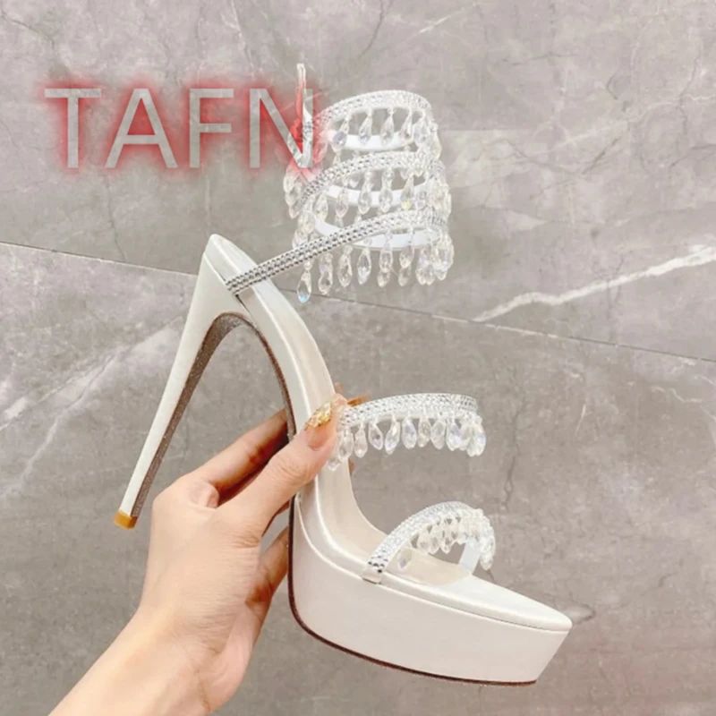 Женские сандалии в форме змеи с кристаллами и бусинами, туфли на высоком каблуке и платформе со стразами, блестящие женские туфли для свадебной вечеринки
Женские сандалии в форме змеи с кристаллами и бусинами, туфли на высоком каблуке и платформе со стразами, блестящие женские туфли для свадебной вечеринки