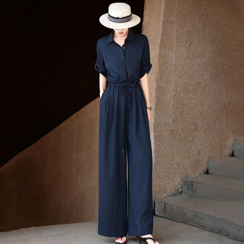 MEXCOCO 2026 New Summer Lapel Collar Half Sleeve Button Front Drawstring High Waist Wide Leg Loose Jumpsuit Romper
MEXCOCO 2026 New Summer Lapel Collar Half Sleeve Button Front Drawstring High Waist Wide Leg Loose Jumpsuit Romper