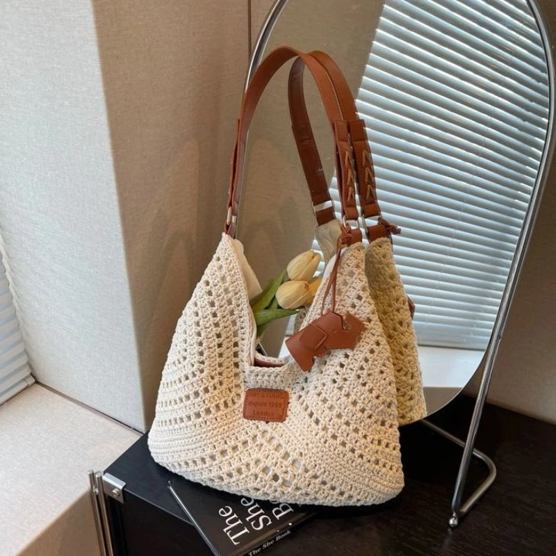 Bag Female 2025 New High-level Sense of Fashion Hollow Shoulder Bag Beach Vacation Straw Weaving Bag
Bag Female 2025 New High-level Sense of Fashion Hollow Shoulder Bag Beach Vacation Straw Weaving Bag