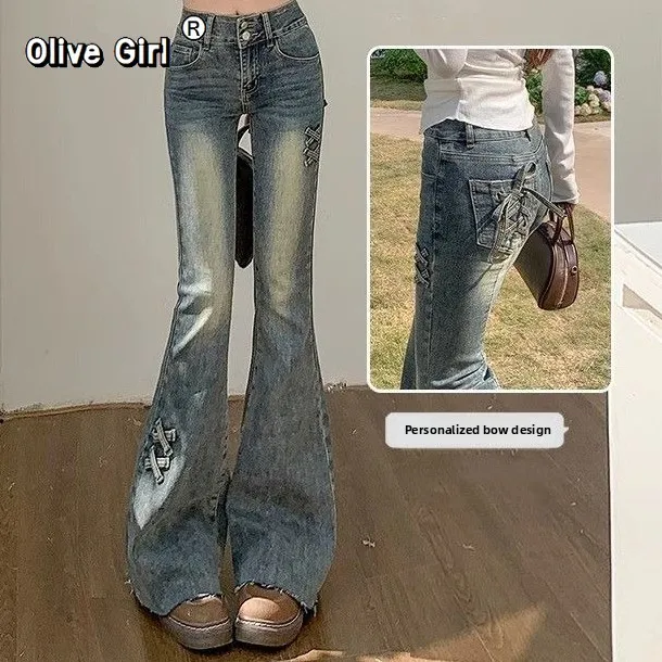 Джинсы Olivegirl, расклешенные джинсы в американском стиле ретро с высокой талией, женские брюки, весна 2026, тонкие эластичные длинные брюки с бантом Y2k
Джинсы Olivegirl, расклешенные джинсы в американском стиле ретро с высокой талией, женские брюки, весна 2026, тонкие эластичные длинные брюки с бантом Y2k