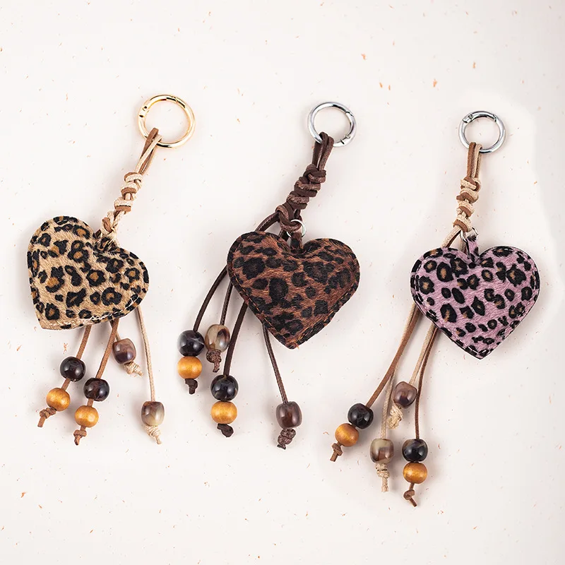 Leopard Print Heart Keychain with Wooden Bead Tassel PU Leather Bag Charm Pendant Cute Key Ring for Purse Backpack Handbag
Leopard Print Heart Keychain with Wooden Bead Tassel PU Leather Bag Charm Pendant Cute Key Ring for Purse Backpack Handbag