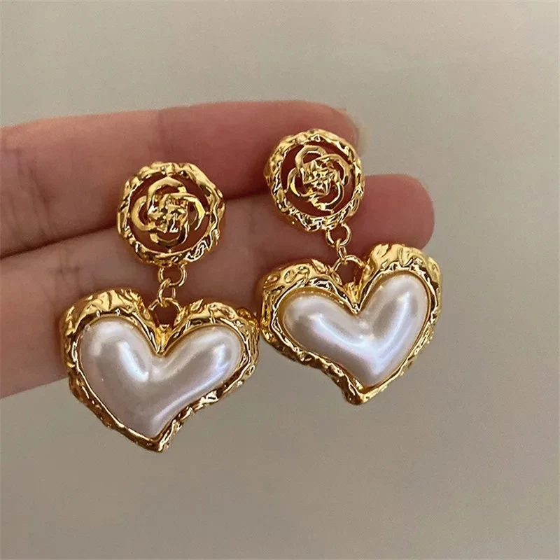 New pleated flower heart earrings imitation pearl French retro fashion luxury accessories women earrings jewelry wedding jewelry
New pleated flower heart earrings imitation pearl French retro fashion luxury accessories women earrings jewelry wedding jewelry