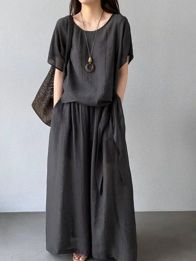 Big Size Thin T-shirt Wide Leg Pants Two Piece Suit New Round Neck Short Sleeve Women Fashion Spring Summer
Big Size Thin T-shirt Wide Leg Pants Two Piece Suit New Round Neck Short Sleeve Women Fashion Spring Summer
