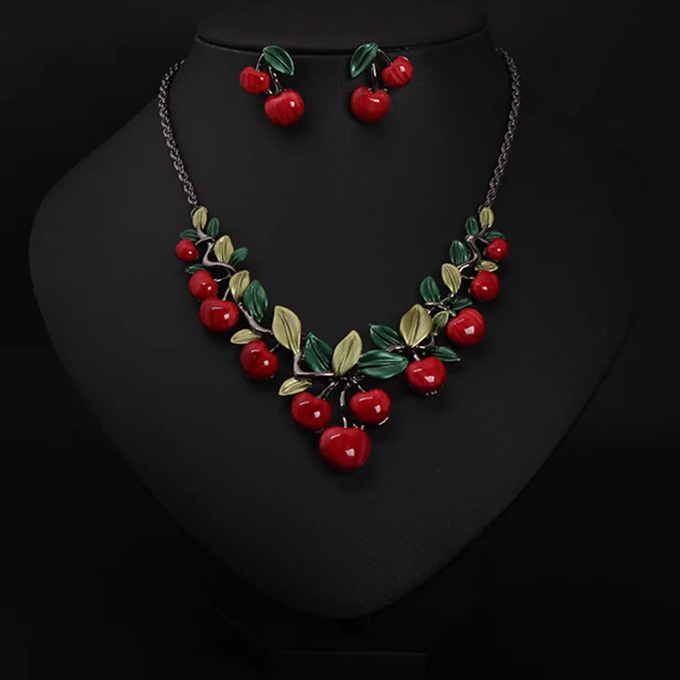 DIY accessories Cross-border hot sale European and American cherry necklace earrings jewelry set dinner dress fashion women exag
DIY accessories Cross-border hot sale European and American cherry necklace earrings jewelry set dinner dress fashion women exag