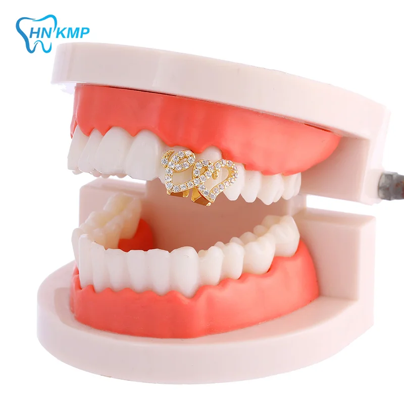 1/2PCS Gold/Silver Color Daily Wearable Tooth Jewelry Dental Grillz Hip Hop Hollow Heart Tooth Grillz For Women
1/2PCS Gold/Silver Color Daily Wearable Tooth Jewelry Dental Grillz Hip Hop Hollow Heart Tooth Grillz For Women