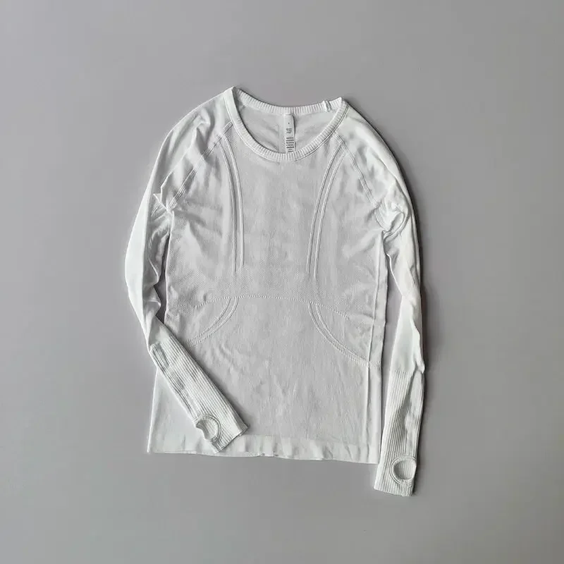 Women's Big-name Yoga Clothes of The Same Style, Sports Long-sleeved Seamless Slimming Pula Quick-drying Running Fitness Clothes
Women's Big-name Yoga Clothes of The Same Style, Sports Long-sleeved Seamless Slimming Pula Quick-drying Running Fitness Clothes