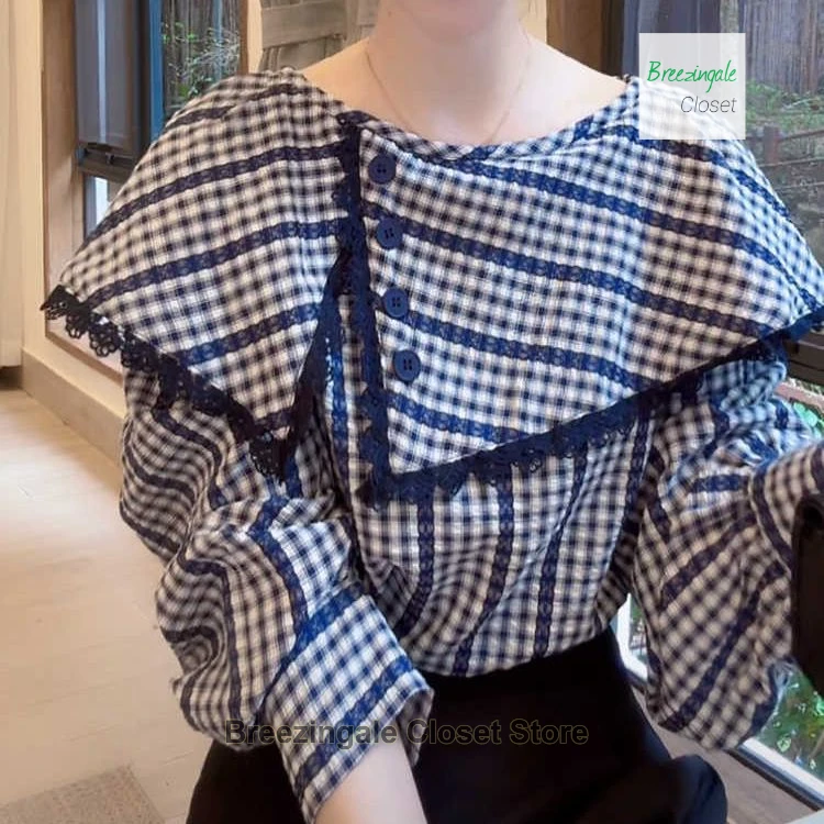 Korean retro long-sleeved plaid shirt female summer new fashion temperament lotus leaf collar design lace stitching shirt.
Korean retro long-sleeved plaid shirt female summer new fashion temperament lotus leaf collar design lace stitching shirt.