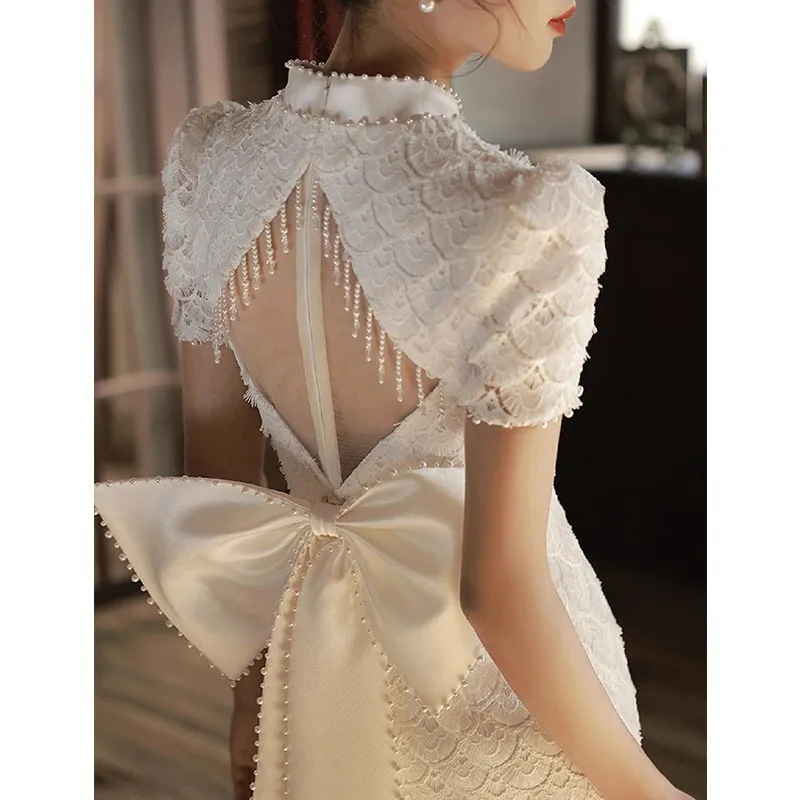 Elegant White Lace Hollow Fishtail Cheongsam Evening Dress for Women Light Luxury High end Open Back Bow Wrap Hip Long Dress
Elegant White Lace Hollow Fishtail Cheongsam Evening Dress for Women Light Luxury High end Open Back Bow Wrap Hip Long Dress
