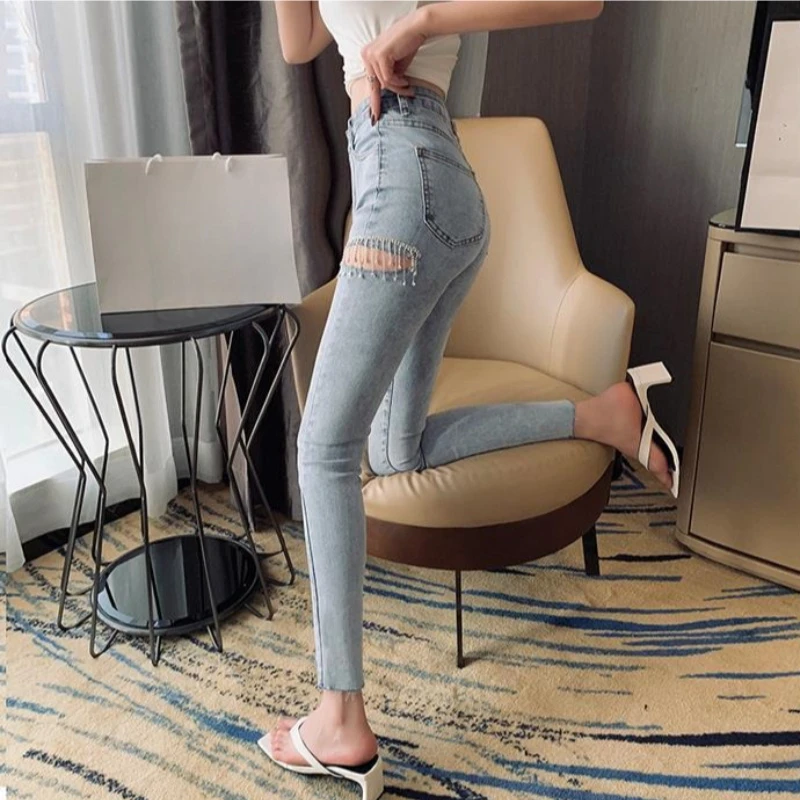 Women's Summer High-Waist Slim Fit Jeans Light Wash Ripped Skinny Stretch Ankle-Length Tapered Trousers
Women's Summer High-Waist Slim Fit Jeans Light Wash Ripped Skinny Stretch Ankle-Length Tapered Trousers
