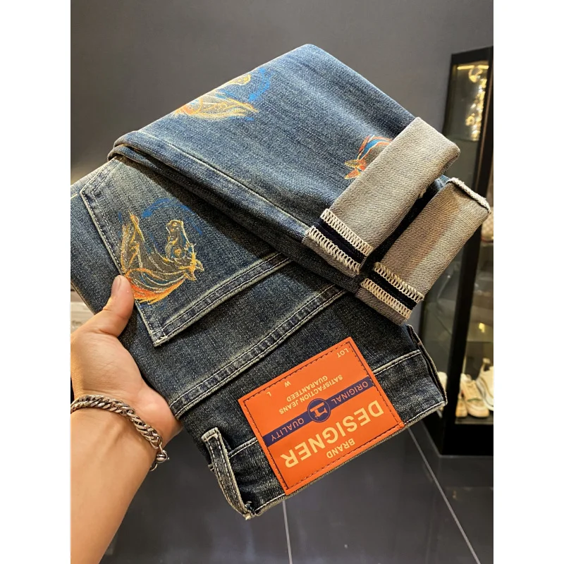 Autumn jeans men 2025 new trend light luxury printed small feet high-end straight leg casual elastic pants
Autumn jeans men 2025 new trend light luxury printed small feet high-end straight leg casual elastic pants