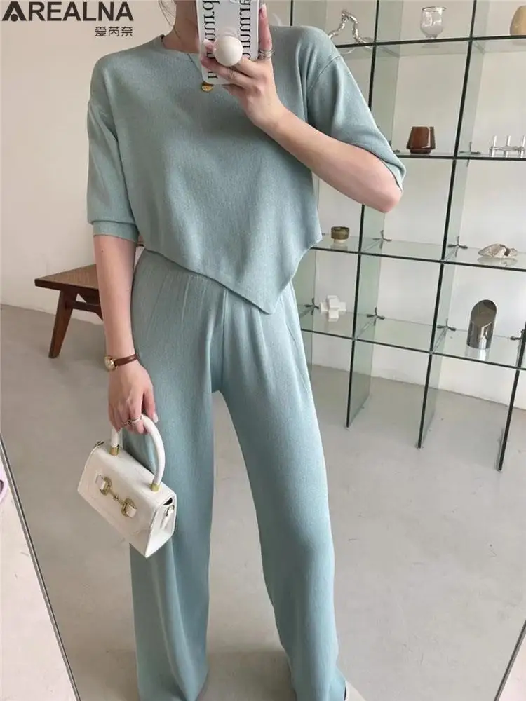 2 Piece Set Women Knitted Tracksuit o-neck asymmetric half sleeve Pullover + High Waist Loose Wide Leg Pants two piece set women
2 Piece Set Women Knitted Tracksuit o-neck asymmetric half sleeve Pullover + High Waist Loose Wide Leg Pants two piece set women