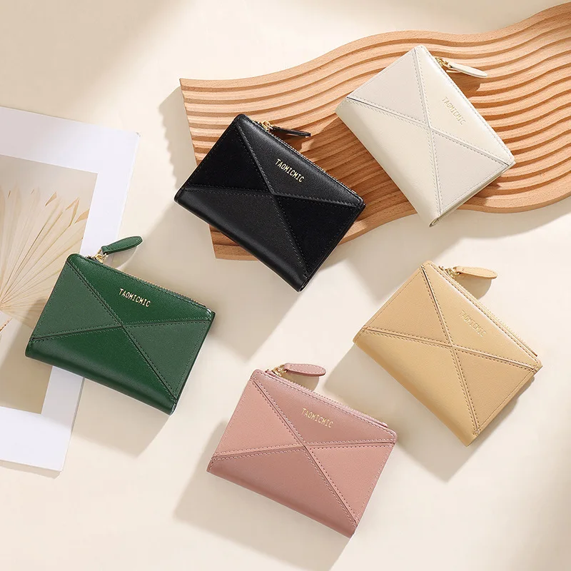 PU leather spliced and folded short women's wallet with contrasting colors and multiple slots, lightweight student wallet
PU leather spliced and folded short women's wallet with contrasting colors and multiple slots, lightweight student wallet