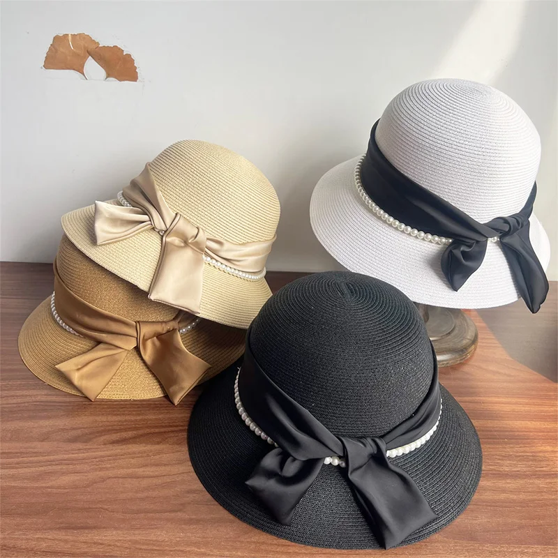 2026 Spring/summer New French Pearl Bow Straw Hat Hepburn Style Sunshade Straw Hat Elegant Wear With Decorative Fisherman's Hat
2026 Spring/summer New French Pearl Bow Straw Hat Hepburn Style Sunshade Straw Hat Elegant Wear With Decorative Fisherman's Hat
