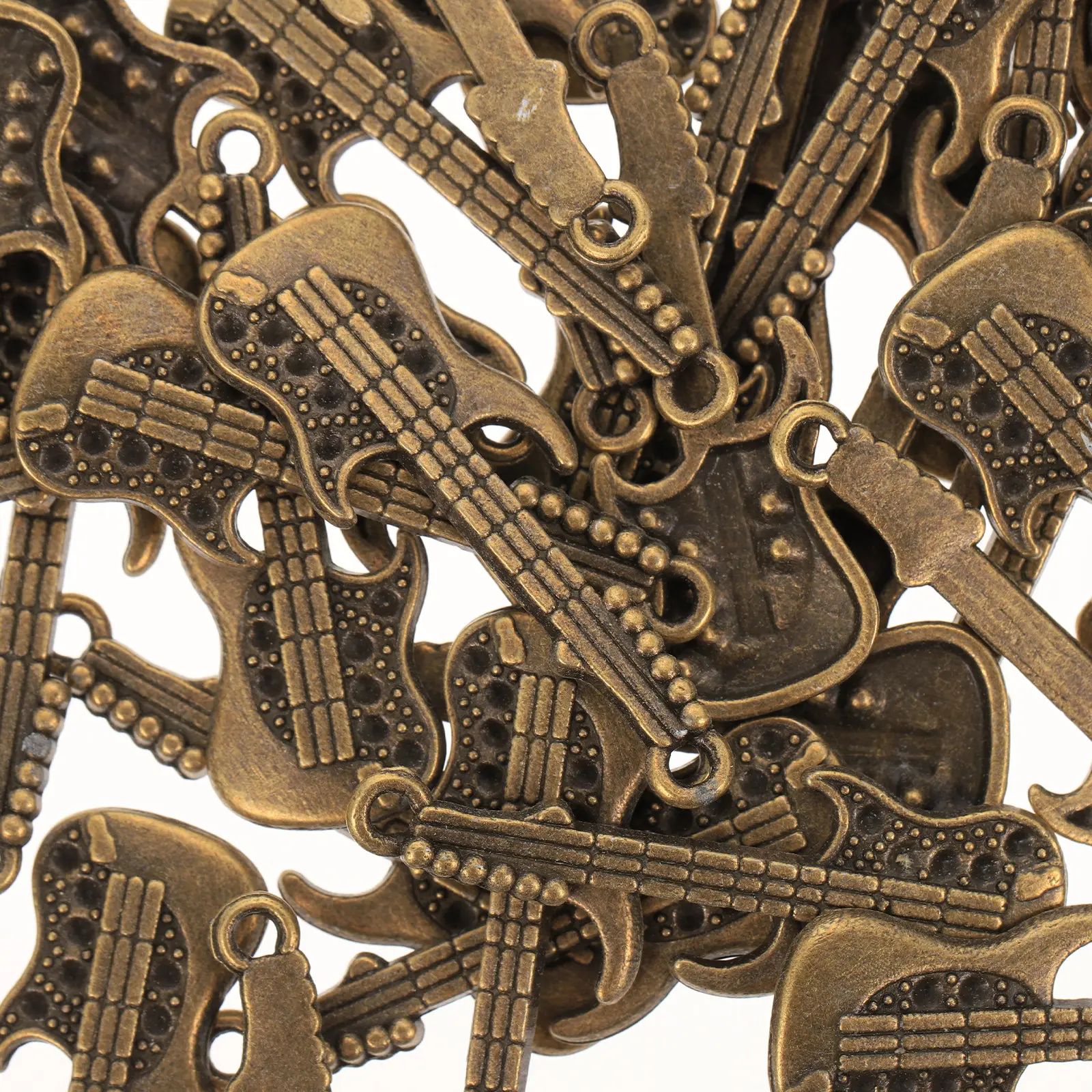 50Pcs Miniature Guitar Charms Zinc Alloy DIY Phone Case Charms for Crafting Jewelry Making Festival Gifts Smooth Metal Guitar
50Pcs Miniature Guitar Charms Zinc Alloy DIY Phone Case Charms for Crafting Jewelry Making Festival Gifts Smooth Metal Guitar