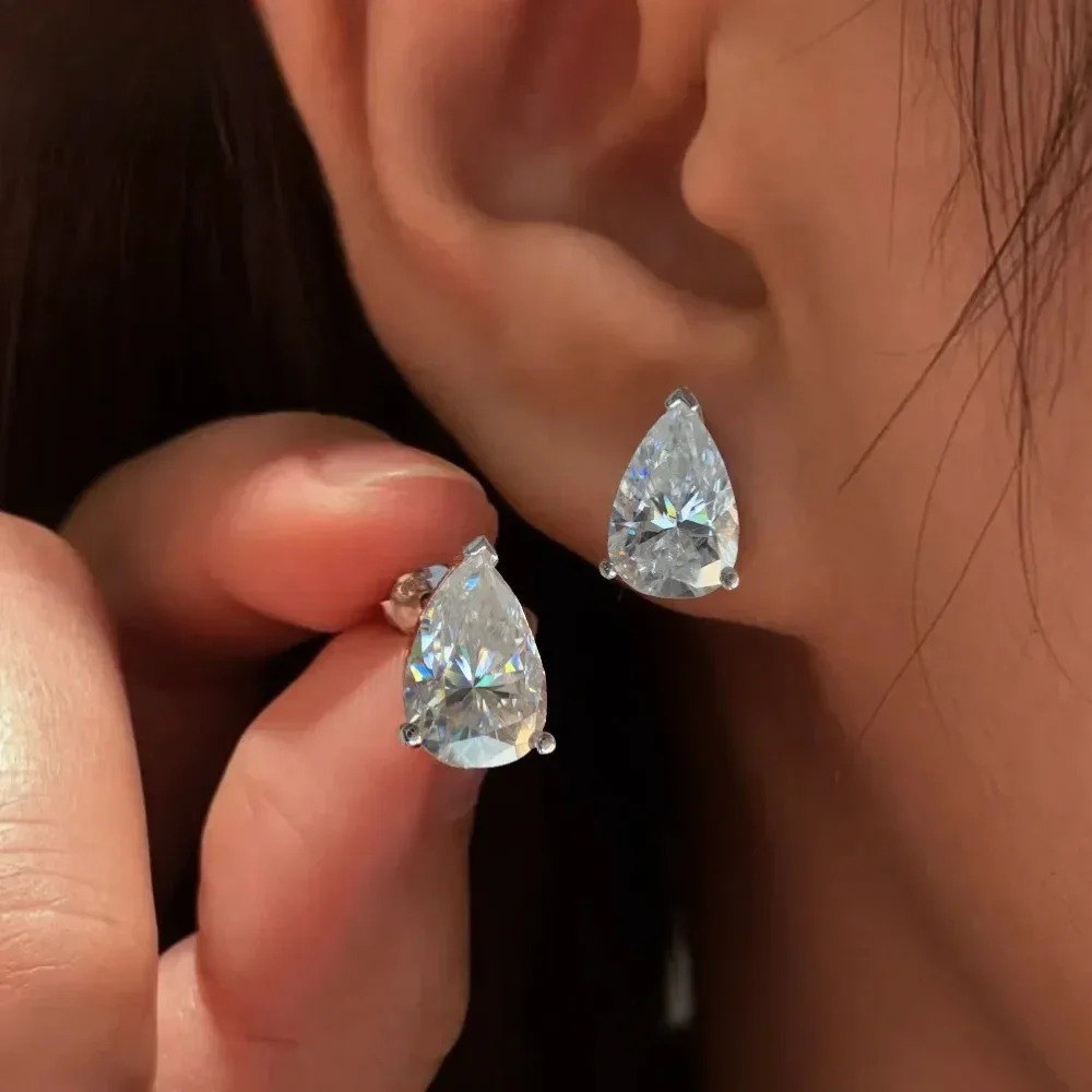 Серьги-гвоздики с муассанитом грушевидной огранки 1-4 карата для женщин, серебро S925, в форме капли, для помолвки, проходят тест на алмазный анализатор, ювелирные изделия
Серьги-гвоздики с муассанитом грушевидной огранки 1-4 карата для женщин, серебро S925, в форме капли, для помолвки, проходят тест на алмазный анализатор, ювелирные изделия