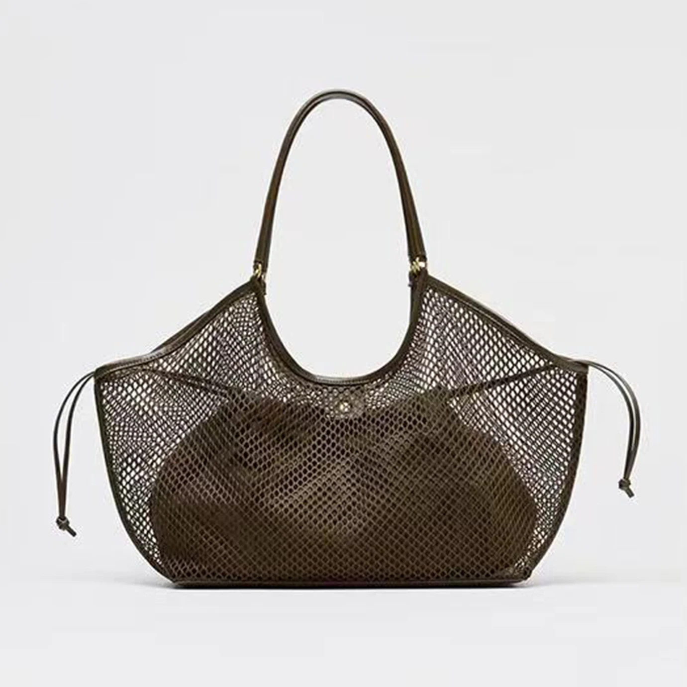 Women's Large Capacity Mesh Beach Travel Shoulder Bag Casual Shopper Tote Beach Toy Storage Hollow Fishing Net Design
Women's Large Capacity Mesh Beach Travel Shoulder Bag Casual Shopper Tote Beach Toy Storage Hollow Fishing Net Design