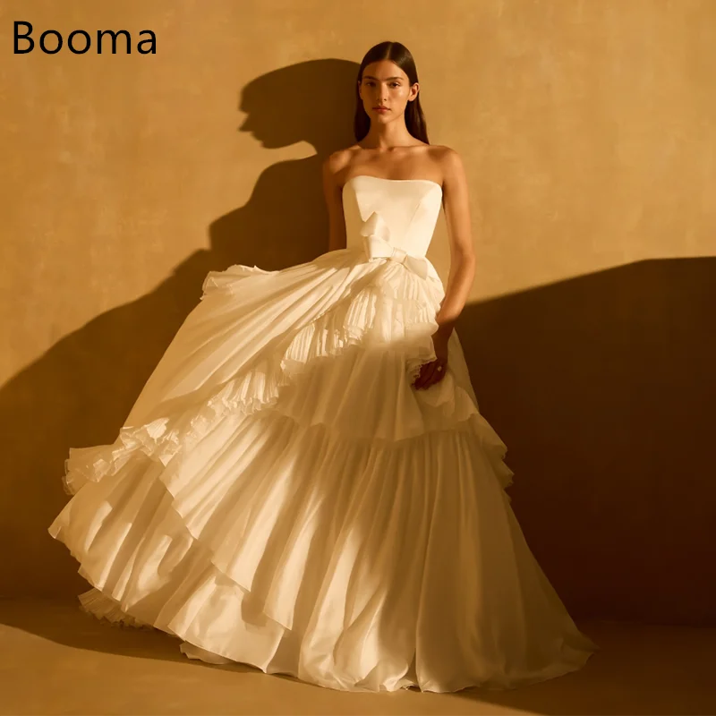 Booma A-Line Bow Simple Strapless Long Wedding Dresses Sleeveless Pleat Elegant Elegant Brides Gown Custom Made 2025
Booma A-Line Bow Simple Strapless Long Wedding Dresses Sleeveless Pleat Elegant Elegant Brides Gown Custom Made 2025