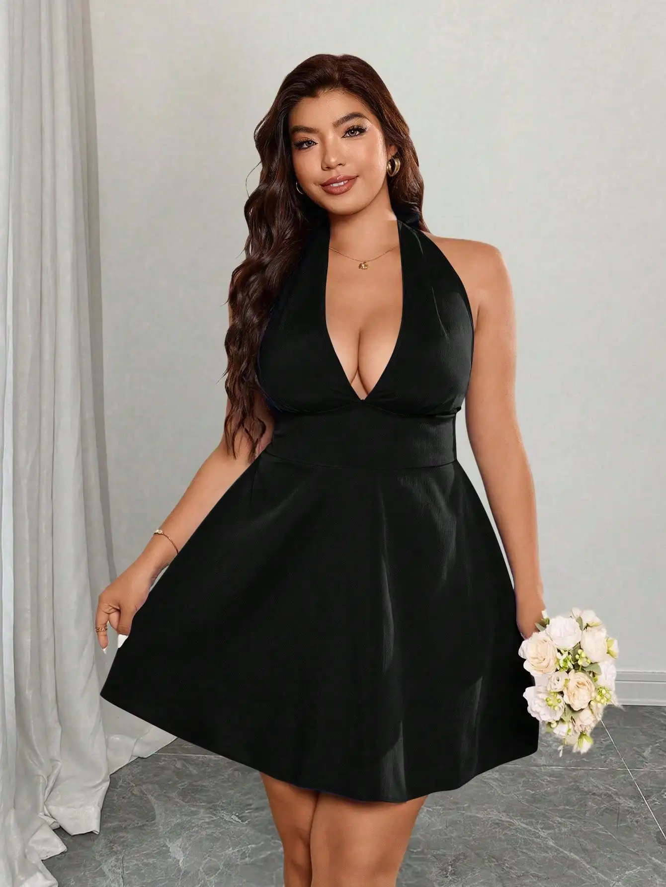Plus Size Black Halter Neck Mini Dress With Deep V Cut And Flared Skirt For Summer Travel And Party Wear
Plus Size Black Halter Neck Mini Dress With Deep V Cut And Flared Skirt For Summer Travel And Party Wear