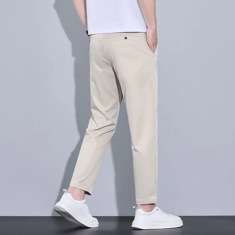 Новые летние брюки из ледяного шелка длиной до щиколотки для мужчин, прямого кроя, модные, тонкие, брендовая одежда, однотонные, повседневные брюки, мужские, размеры 28-38.
Новые летние брюки из ледяного шелка длиной до щиколотки для мужчин, прямого кроя, модные, тонкие, брендовая одежда, однотонные, повседневные брюки, мужские, размеры 28-38.