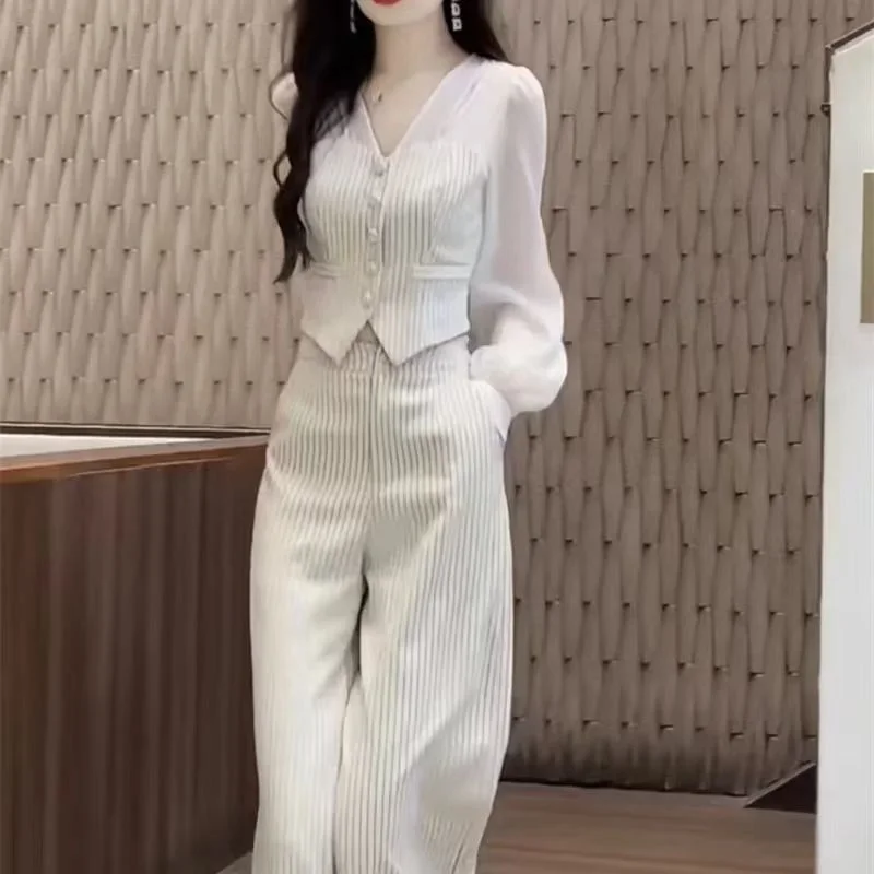 New Autumn Striped Women's Two Piece Set Fashion Patchwork Long Sleeve V-neck Slim Shirt Top + Wide Leg Pants Office Lady Suit
New Autumn Striped Women's Two Piece Set Fashion Patchwork Long Sleeve V-neck Slim Shirt Top + Wide Leg Pants Office Lady Suit