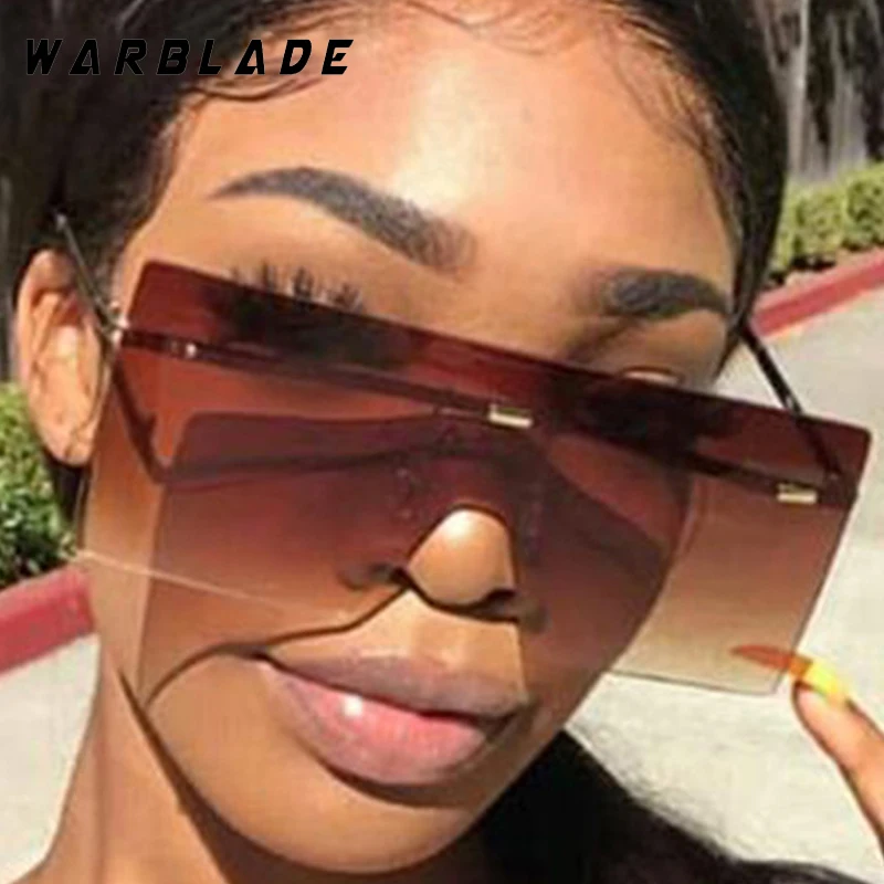 Y2K Trend Design Oversized Square Rimless Women's Sunglasses Punk Brand One-Piece Men Sunglass Drive Travel Female Eyewear UV400
Y2K Trend Design Oversized Square Rimless Women's Sunglasses Punk Brand One-Piece Men Sunglass Drive Travel Female Eyewear UV400
