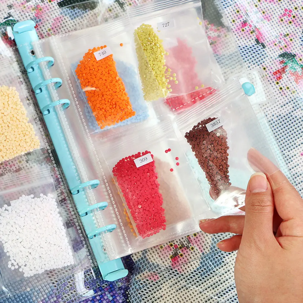 1Set Diamond Drawing Storage Book with Reusable Self-Closing Bags Portable Compact Rhinestone Container for DIY Diamond Dotting
1Set Diamond Drawing Storage Book with Reusable Self-Closing Bags Portable Compact Rhinestone Container for DIY Diamond Dotting