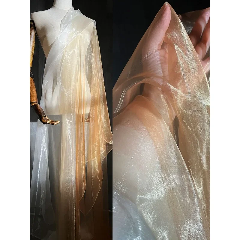 Golden coffee gradient liquid texture glossy gauze material soft perspective light floating big sleeve shirt designer fabric
Golden coffee gradient liquid texture glossy gauze material soft perspective light floating big sleeve shirt designer fabric