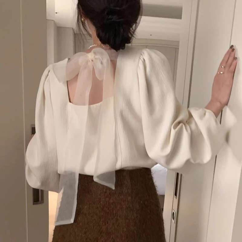 Ele Loose Women's irt with Knot Ba And Bubble Sves Faionable Korean Sle Long Sve V-Ne Top
Ele Loose Women's irt with Knot Ba And Bubble Sves Faionable Korean Sle Long Sve V-Ne Top