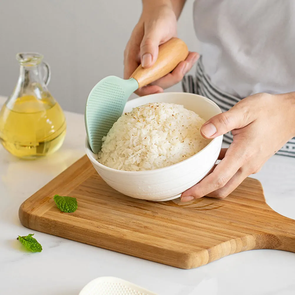 Silicone Rice Spoon with Wooden Handle Practical Ergonomic Household Rice Paddle Compact Kitchen Scooper Spatula 
Silicone Rice Spoon with Wooden Handle Practical Ergonomic Household Rice Paddle Compact Kitchen Scooper Spatula