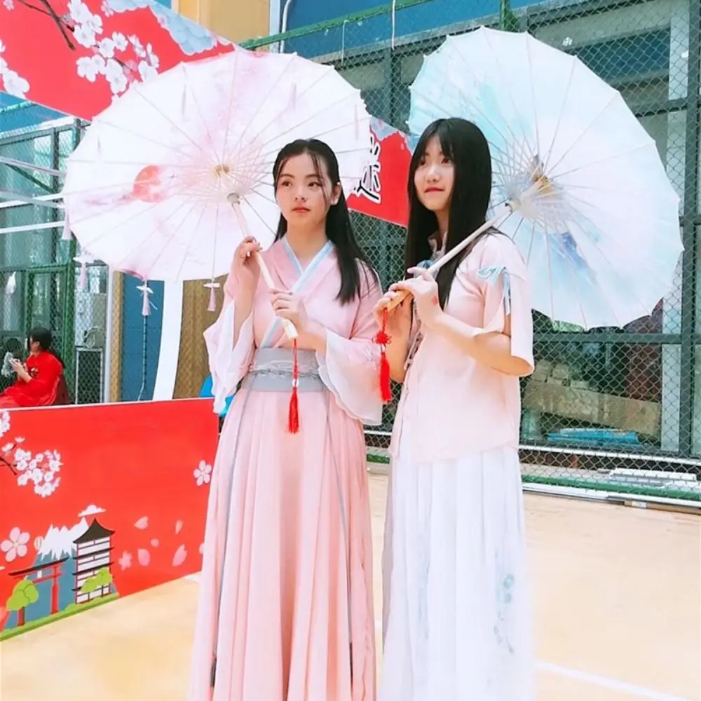 Зонт из промасленной бумаги в китайском античном стиле, 56 см, 10 цветов, костюмы, зонтик для фотосъемки, зонтик для танцевального выступления
Зонт из промасленной бумаги в китайском античном стиле, 56 см, 10 цветов, костюмы, зонтик для фотосъемки, зонтик для танцевального выступления