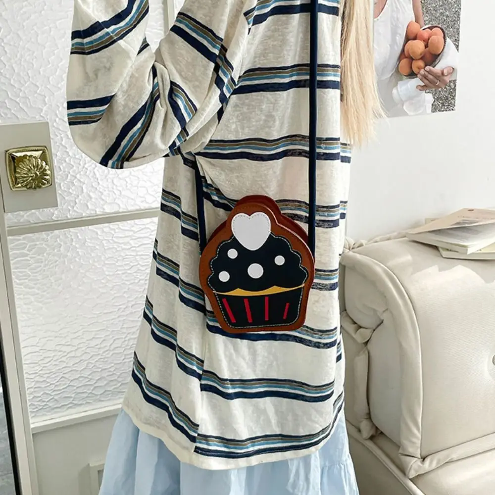 Portable Cute Cupcake Shape Crossbody Bag Mini Cake Cartoon Shoulder Bag Handbag Creative Small Messenger Bag Students
Portable Cute Cupcake Shape Crossbody Bag Mini Cake Cartoon Shoulder Bag Handbag Creative Small Messenger Bag Students