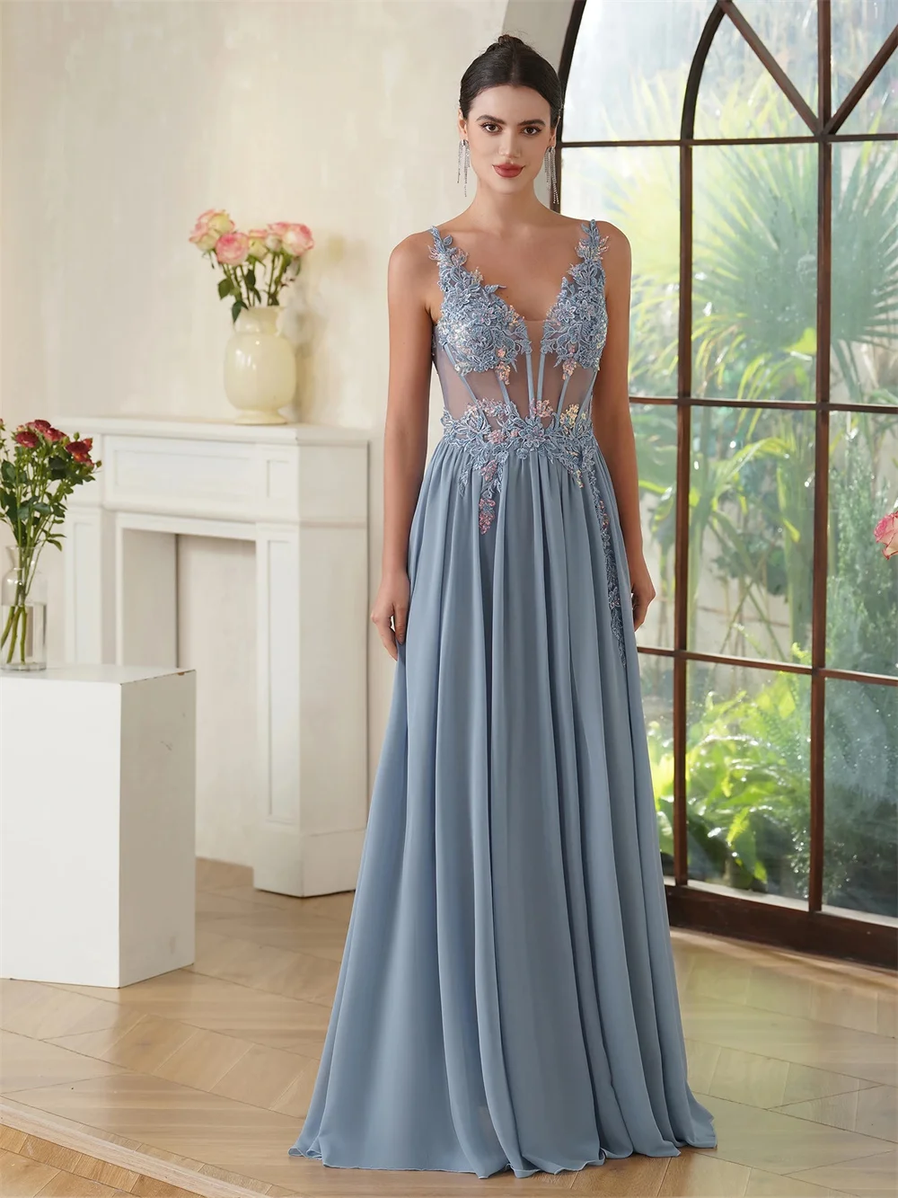 Dusty blue V-neck sleeveless floor-length gown with delicate beading. Flowing drape, fully customized to create your elegant and
Dusty blue V-neck sleeveless floor-length gown with delicate beading. Flowing drape, fully customized to create your elegant and