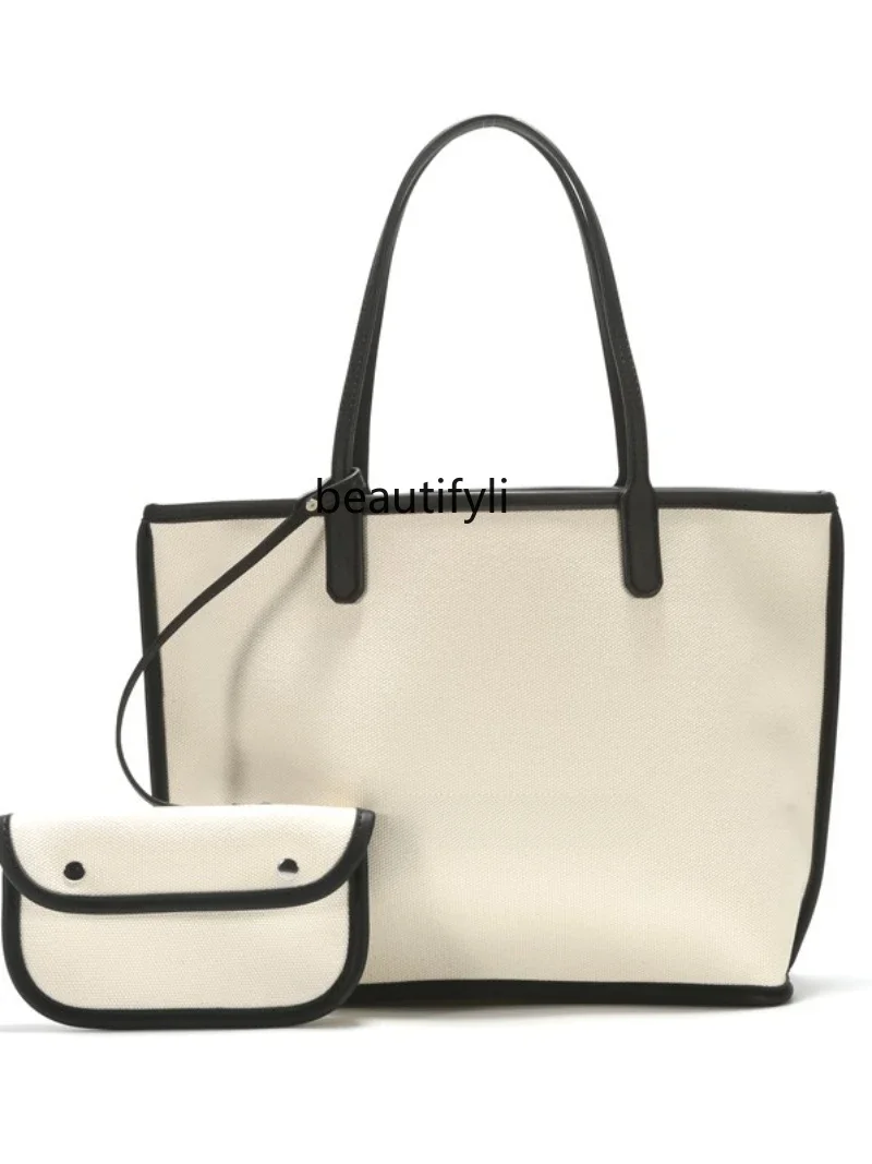 Niche texture canvas tote bag women's large-capacity casual child and mother bag portable shoulder bag
Niche texture canvas tote bag women's large-capacity casual child and mother bag portable shoulder bag
