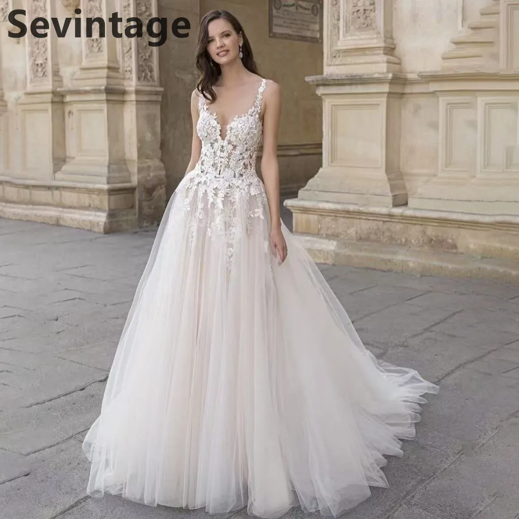 Sevintage Customized 2025 Boho Backless Spaghetti Straps Wedding Dress Tulle A Line Lace Appliques V Neck Bridal Gowns
Sevintage Customized 2025 Boho Backless Spaghetti Straps Wedding Dress Tulle A Line Lace Appliques V Neck Bridal Gowns